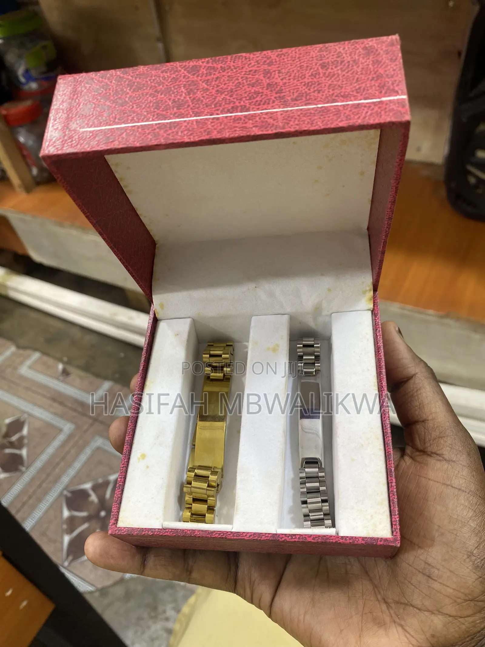 A Pair of Gold Silver Metallic Bracelets