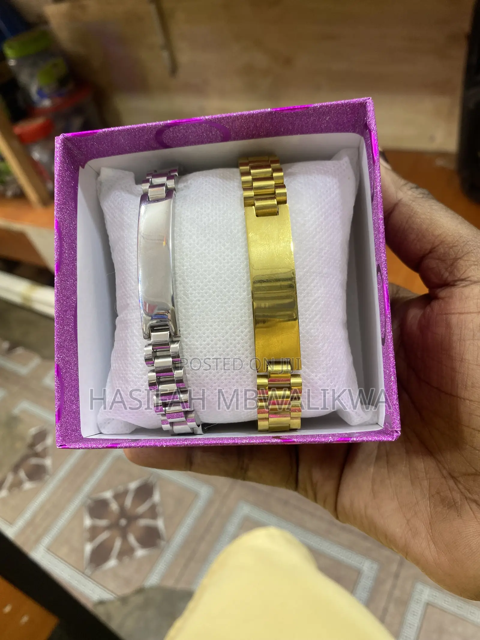 A Pair of Gold Silver Metallic Bracelets
