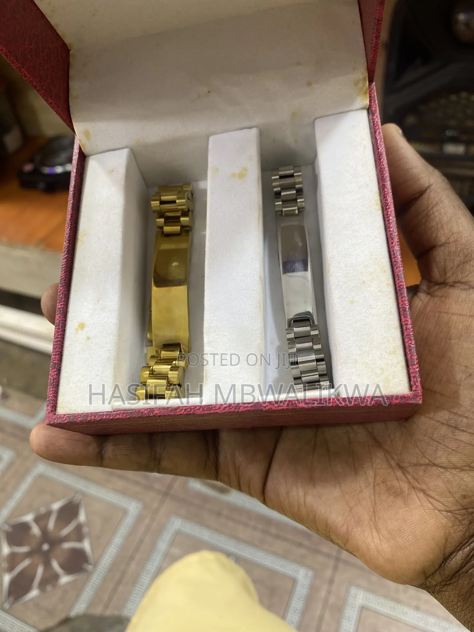 A Pair of Gold Silver Metallic Bracelets