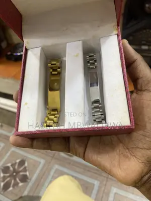 A Pair of Gold Silver Metallic Bracelets