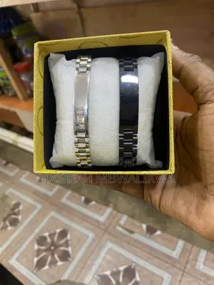 A Pair of Black Silver Metallic Bracelets