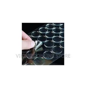 Clear, Double-Sided Adhesive Dots or Cabinet Bumpers Used for Mounting