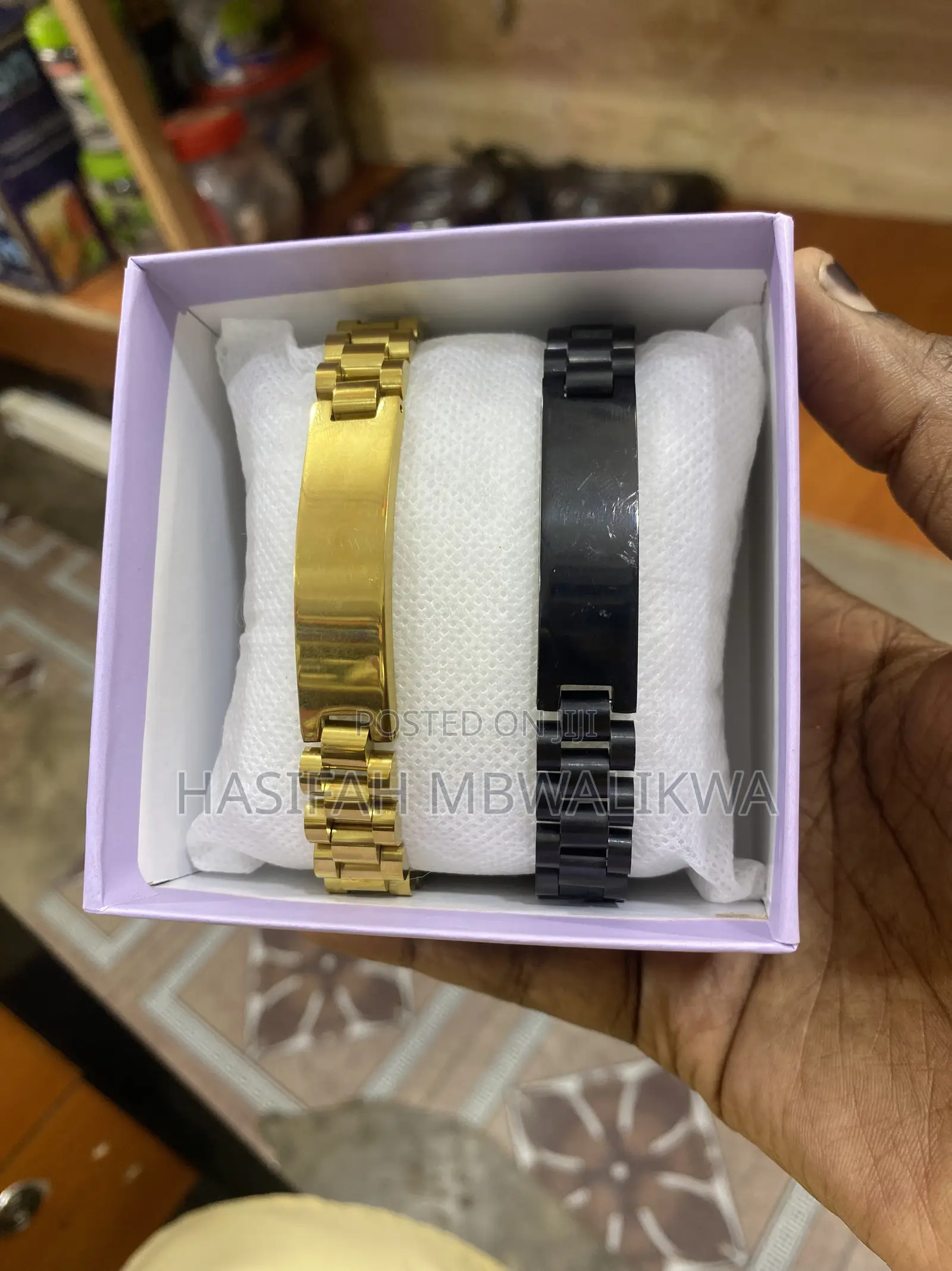 A Pair of Black Gold Bracelets