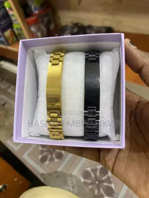 A Pair of Black Gold Bracelets