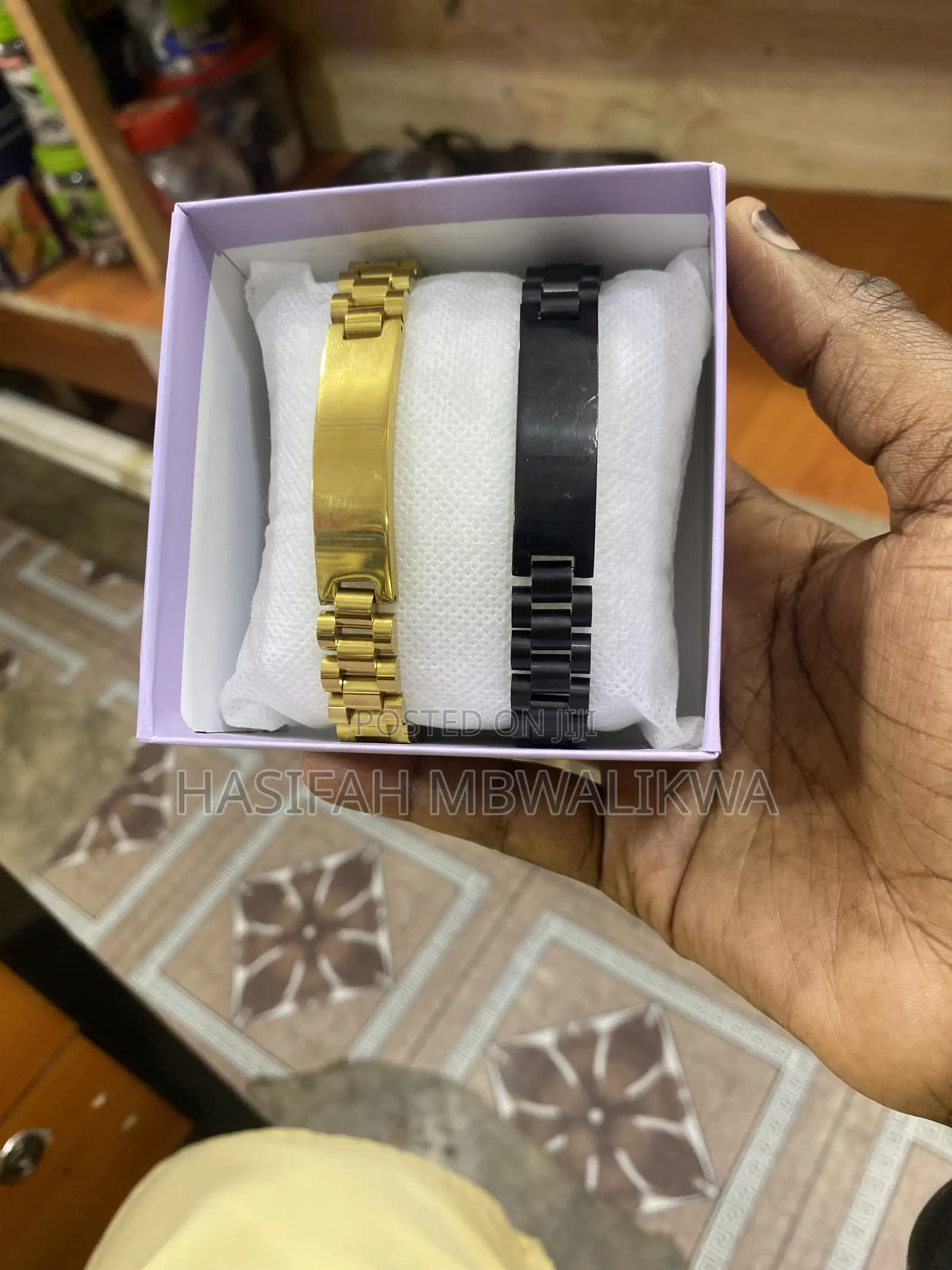 A Pair of Black Gold Bracelets