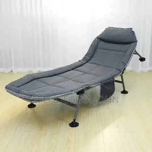 Adjustable Reclining Folding Camping Cot With Built-in Mattress Pad.