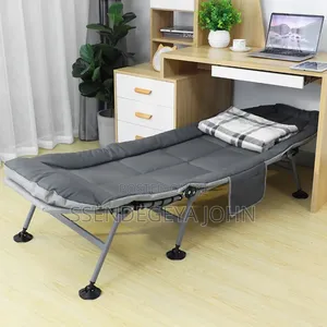 Adjustable Reclining Folding Camping Cot With Built-in Mattress Pad.