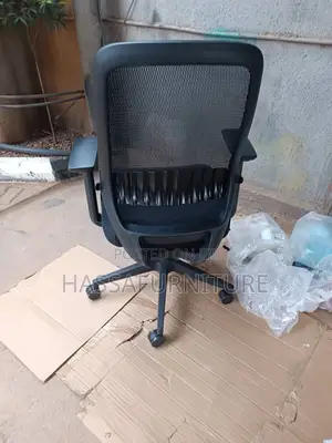 Short Back Mesh Chair With Adjustable Arms