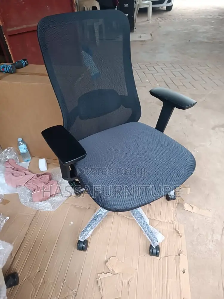 Short Back Mesh Chair With Adjustable Arms