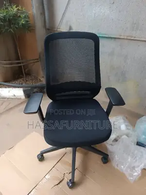 Short Back Mesh Chair With Adjustable Arms