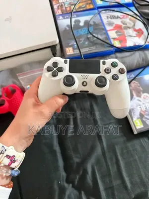White Ps4 Slim Console With Two Controllers