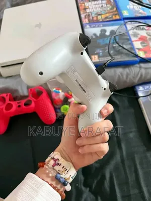 White Ps4 Slim Console With Two Controllers