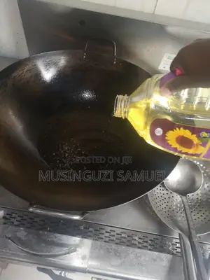 This Is a Wok, Which Is a Versatile, Round-Bottomed Cooking Pan From C