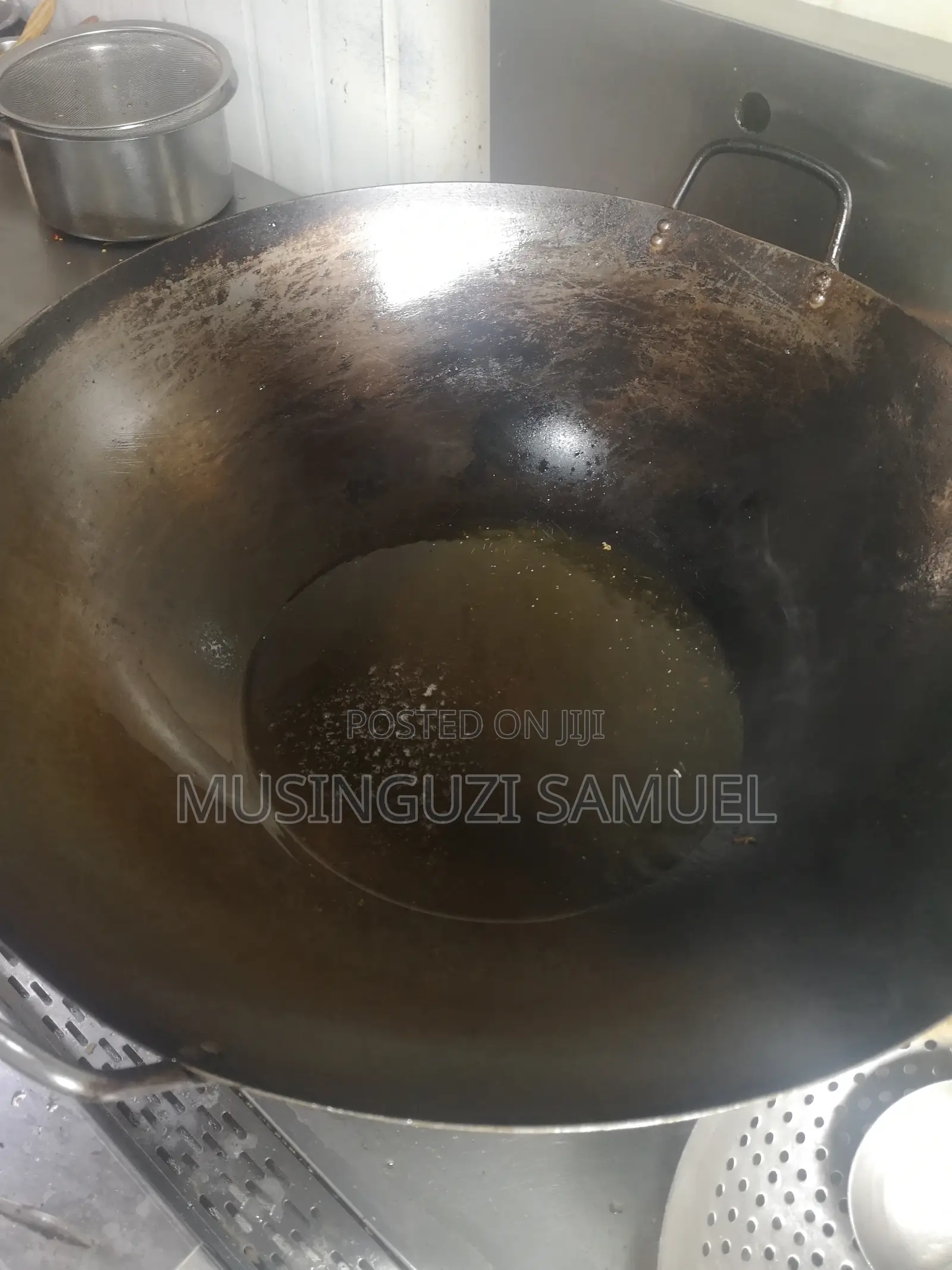 This Is a Wok, Which Is a Versatile, Round-Bottomed Cooking Pan From C