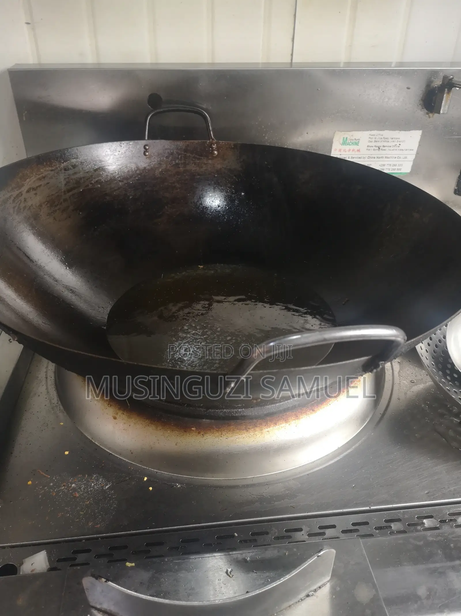 This Is a Wok, Which Is a Versatile, Round-Bottomed Cooking Pan From C