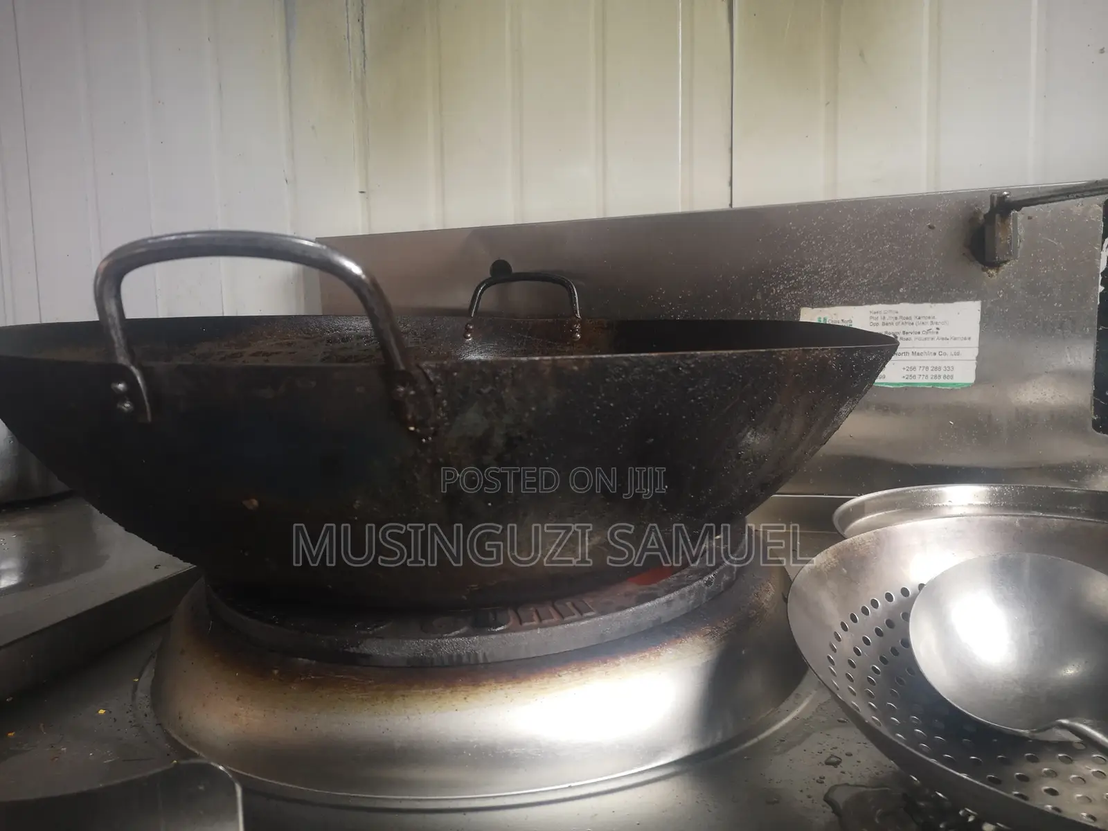 This Is a Wok, Which Is a Versatile, Round-Bottomed Cooking Pan From C