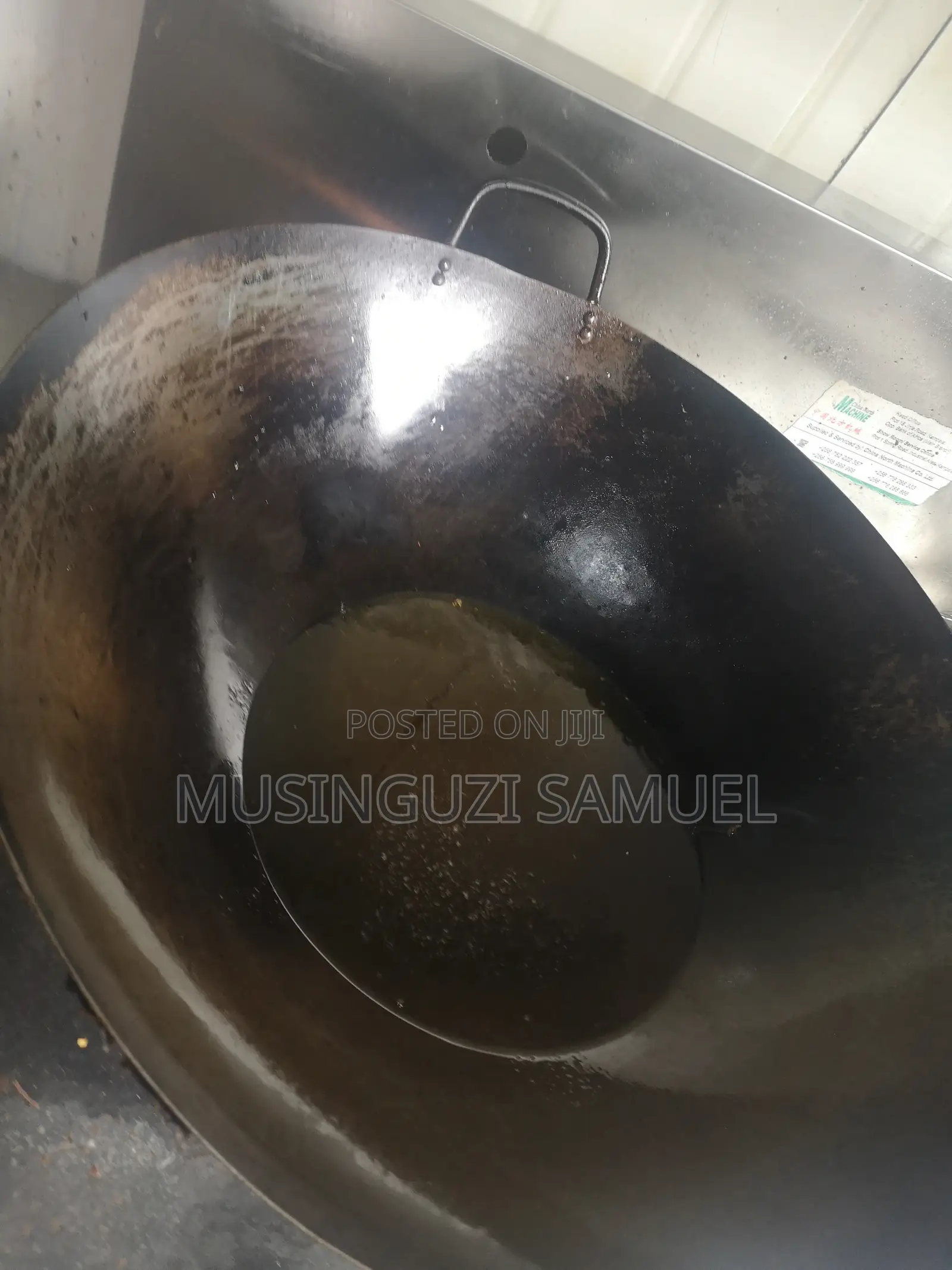 This Is a Wok, Which Is a Versatile, Round-Bottomed Cooking Pan From C