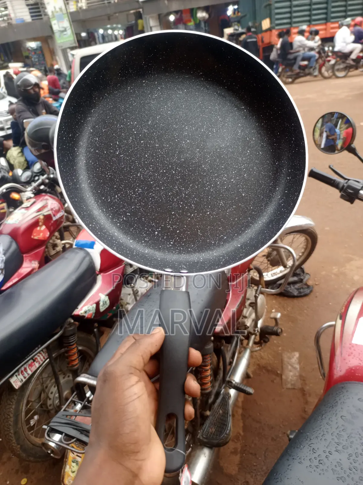 Granite-Coated Non-Stick Frying Pan With an Ergonomic Black Handle.