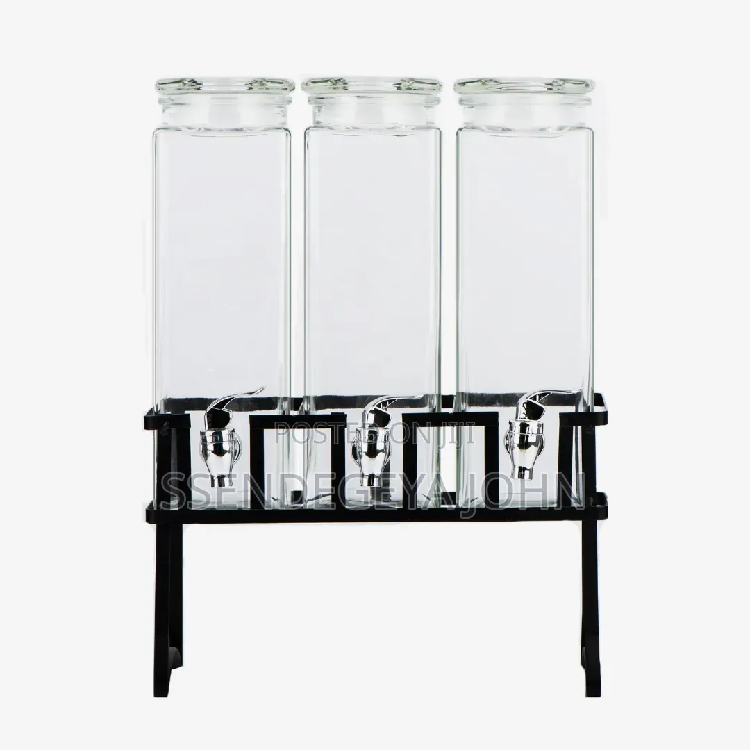 Triple Glass Beverage Dispenser Set With a Metal Stand.