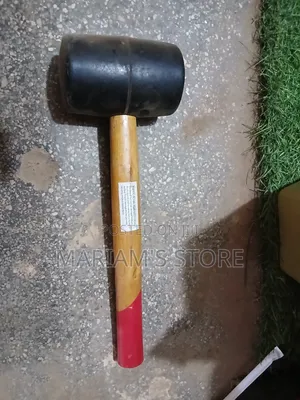 Black Rubber Mallet With a Wooden Handle