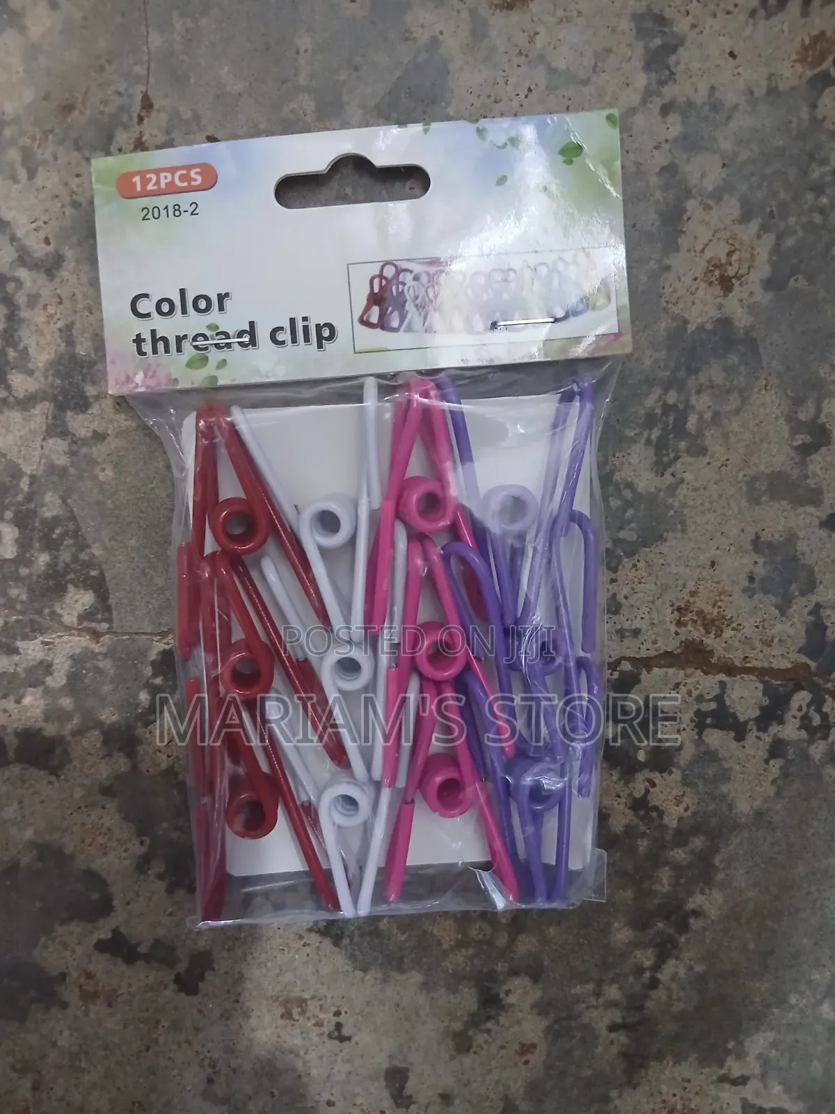 A Pack of Colorful, Coated Pegs