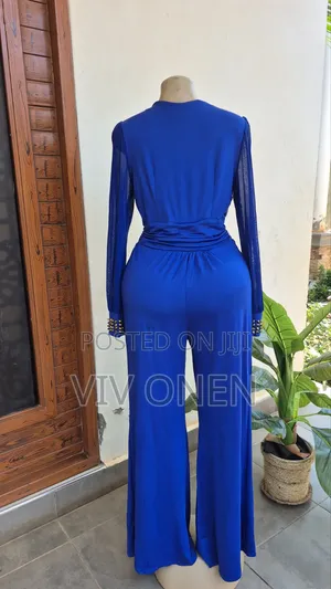Elegant Blue Jumsuit With Lacy Long Sleeves.