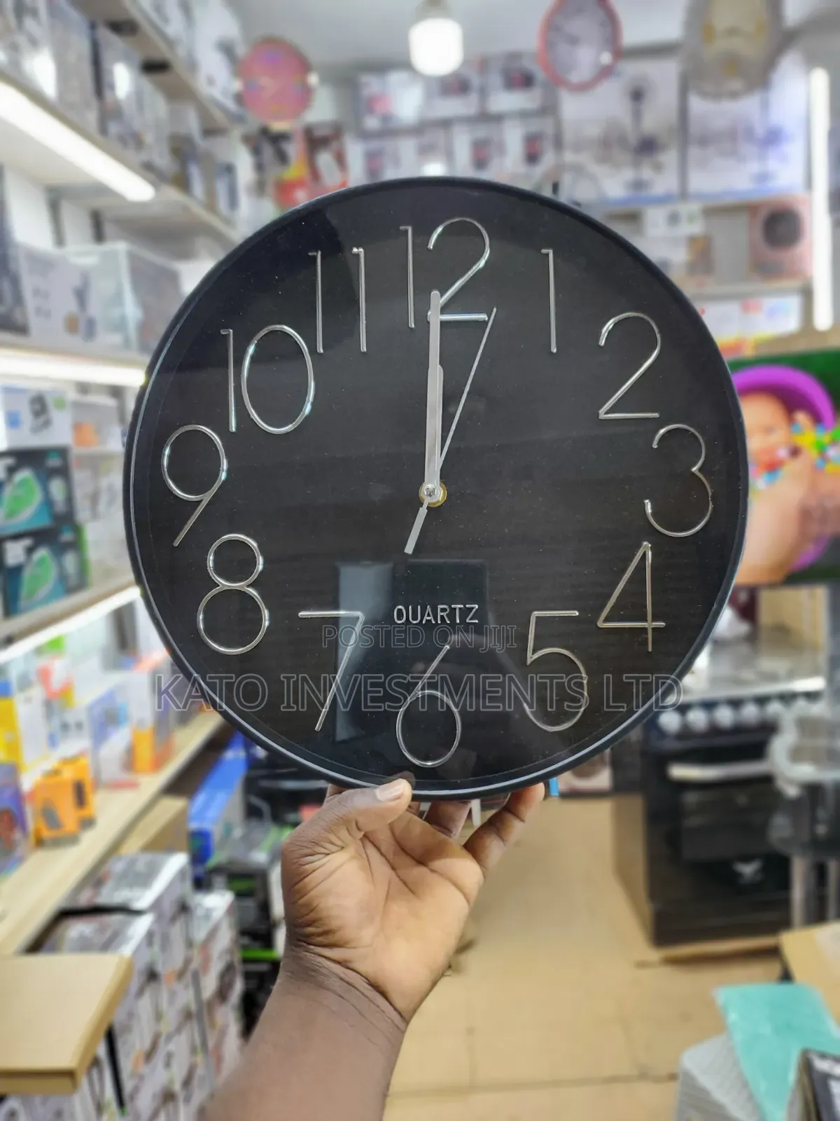 Modern Black Quartz Wall Clock With Silver
