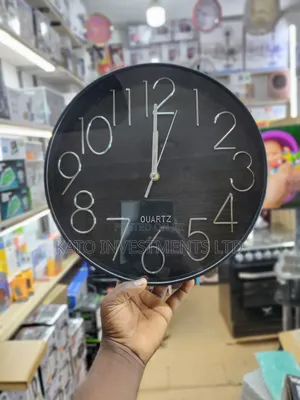 Modern Black Quartz Wall Clock With Silver