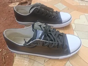 Black Low Top All Star Sneakers – Size 9.5