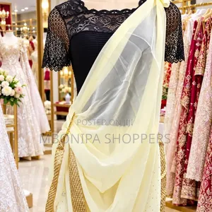 Elegant Mushanana – Ivory Gold Traditional Dress