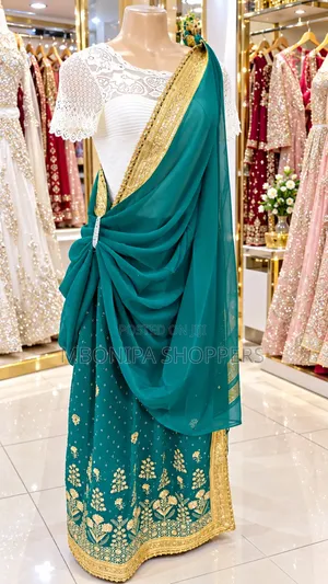 Mushanana – Elegant Teal Gold Traditional Outfit