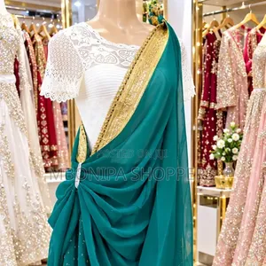 Mushanana – Elegant Teal Gold Traditional Outfit