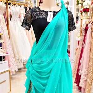Elegant Turquoise Mushanana – Stylish Traditional Ceremonial Wear