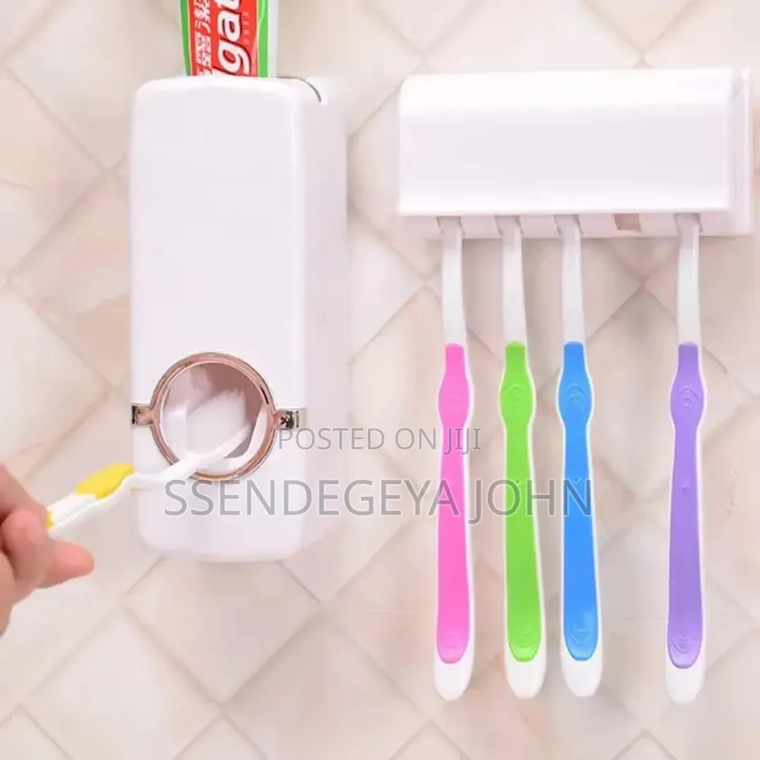 Jx-200 Automatic Toothpaste Dispenser and Toothbrush Holder Set.