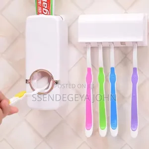 Jx-200 Automatic Toothpaste Dispenser and Toothbrush Holder Set.