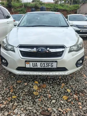 Subaru Impreza 2.0i Limited PZEV 4dr Hatchback AWD (2.0L 4cyl CVT) 2014
