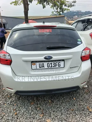 Subaru Impreza 2.0i Limited PZEV 4dr Hatchback AWD (2.0L 4cyl CVT) 2014