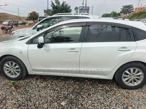 Subaru Impreza 2.0i Limited PZEV 4dr Hatchback AWD (2.0L 4cyl CVT) 2014