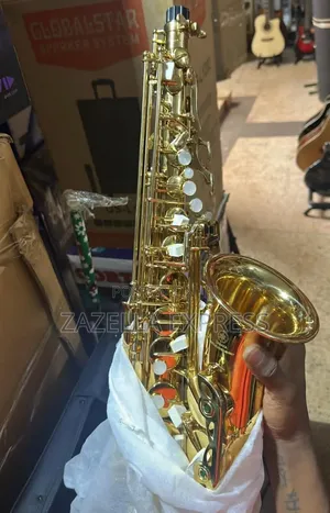Brand New Yamaha Alto Saxophone With Strap, Reed and Box