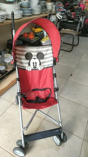 UK Used Disney Mickey Mouse Light Weight Folding Travel Stroller.
