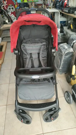 UK Used Red and Dark Gray Graco Verb Click Connect Folding Stroller.
