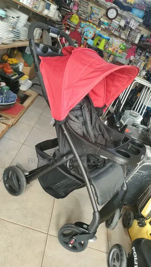 UK Used Red and Dark Gray Graco Verb Click Connect Folding Stroller.