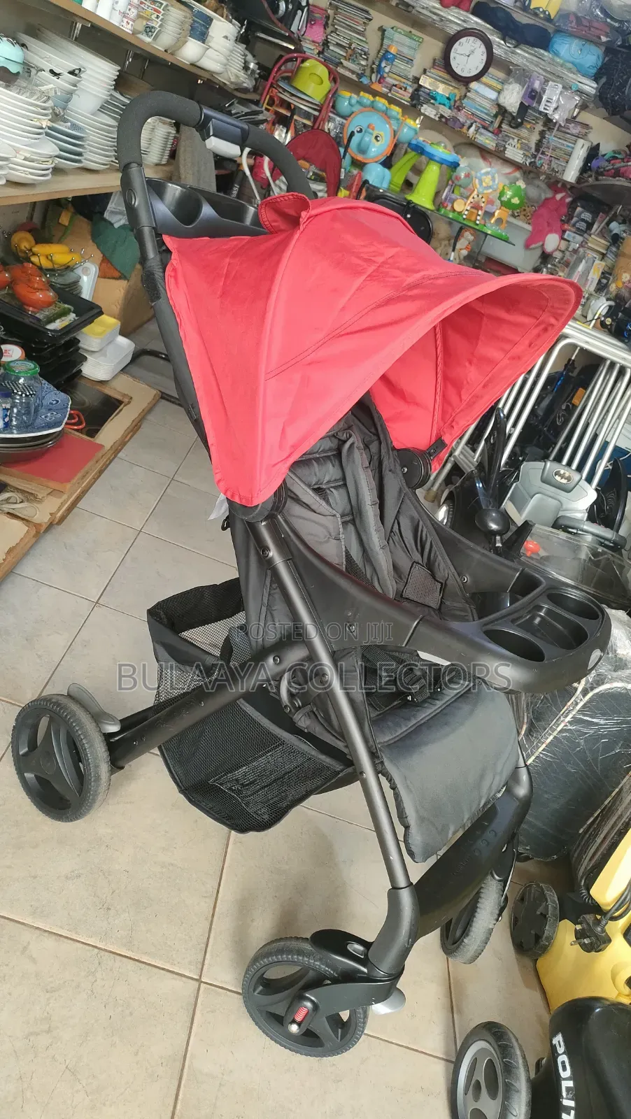 UK Used Red and Dark Gray Graco Verb Click Connect Folding Stroller.