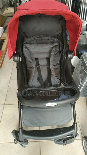 UK Used Red and Dark Gray Graco Verb Click Connect Folding Stroller.