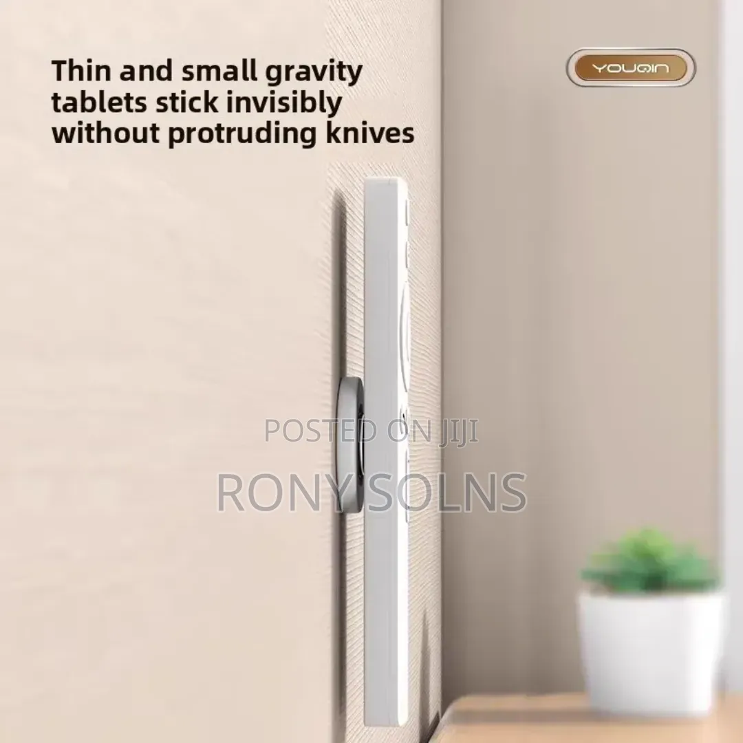 Magnetic Remote Holder Attached to a Wall