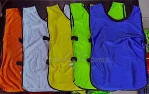 Football Bibes All Different Colors and Sizes Original Material