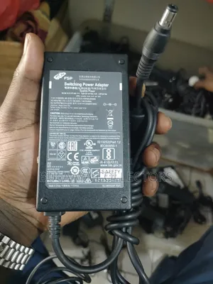 UK Used FSP Switching Power Adapter, 12V~5A.