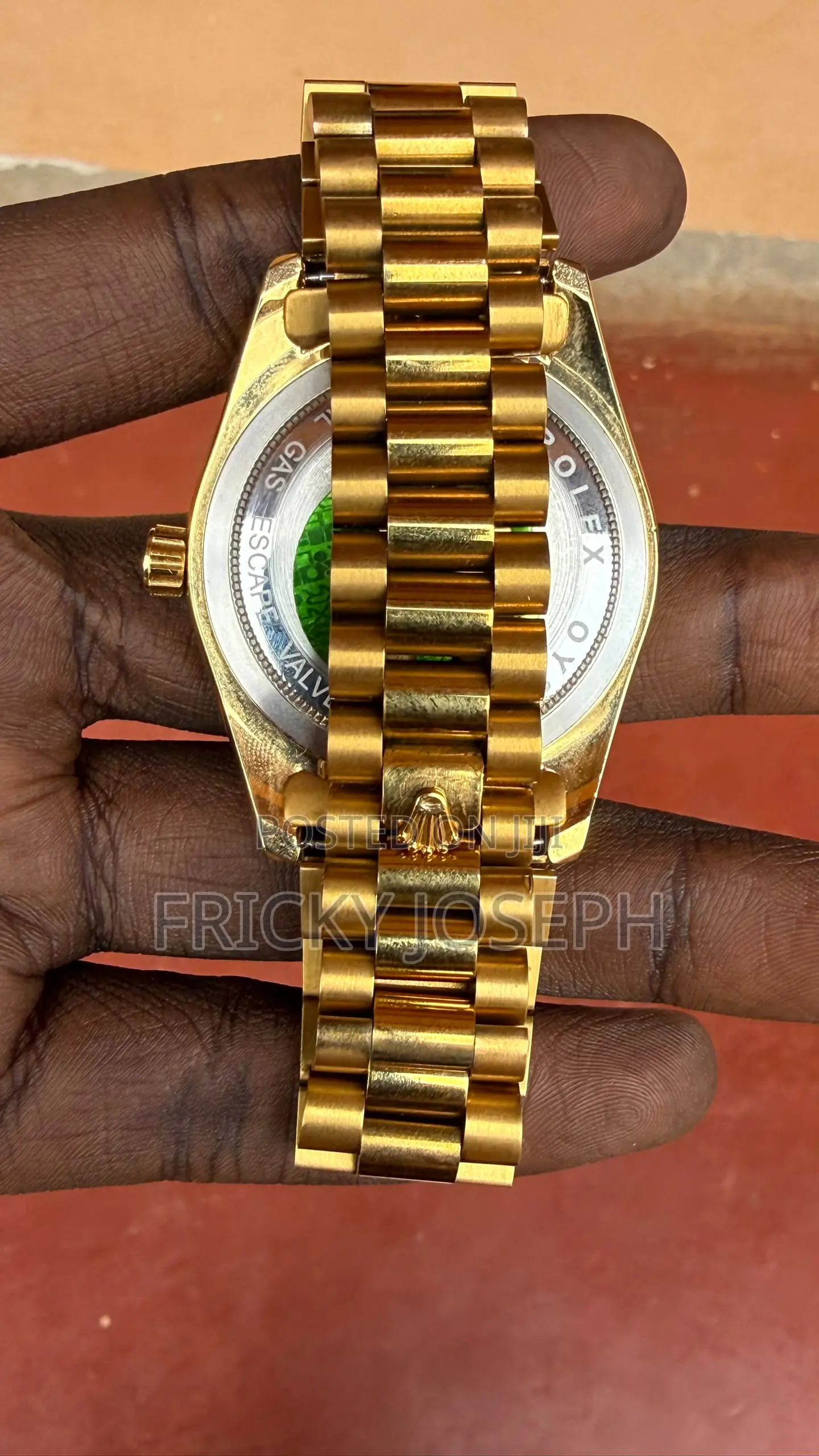A Rolex Watch Golden Colour