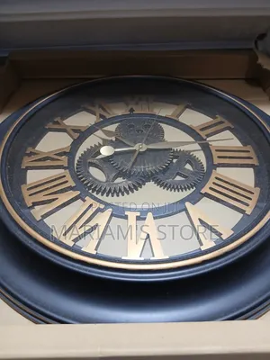 Large Vintage-Style Wall Clock in a Black Frame and 3D Gold Roman