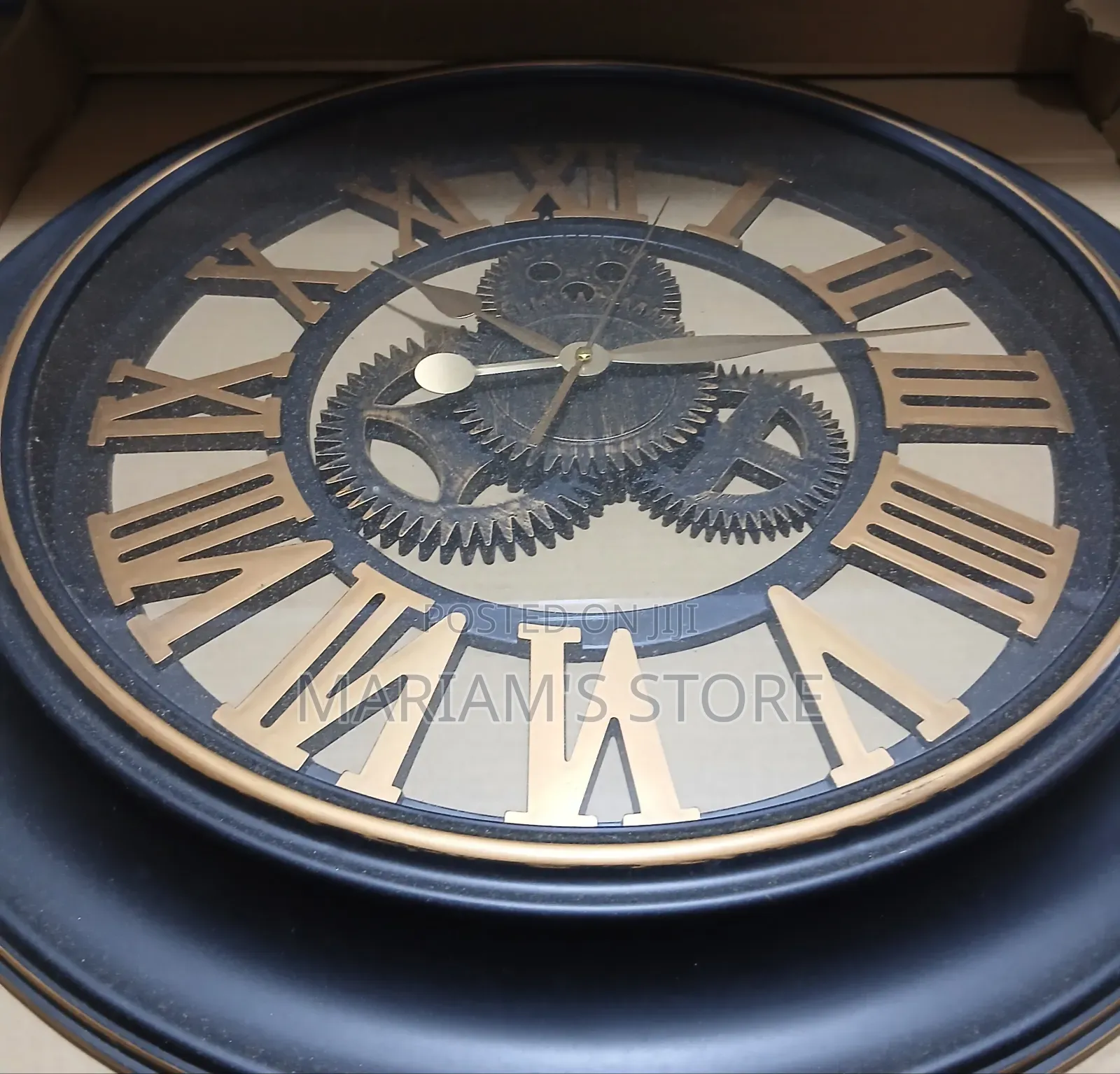 Large Vintage-Style Wall Clock in a Black Frame and 3D Gold Roman